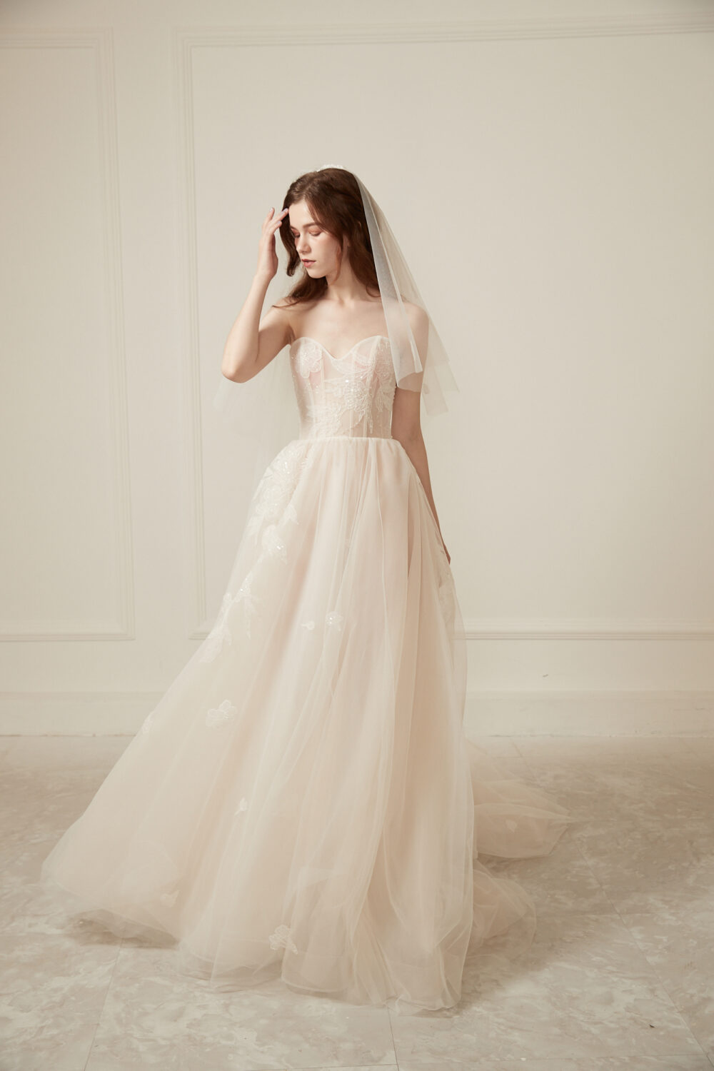 Ethereal Strapless A-Line Wedding Dress – Soft Champagne Tulle - Image 2