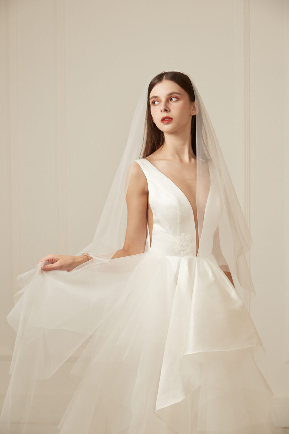 Layered mikado and tulle ball gown with deep V neckline by Guillermo Pharis